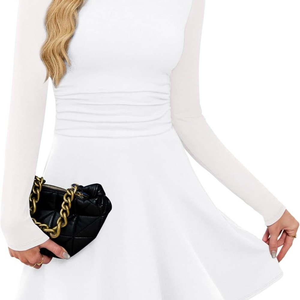 Elegant white long-sleeved dress. Size S. New with tags.